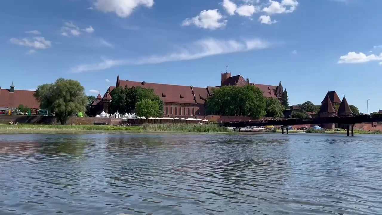 Malbork Castle seen across the Nogat River