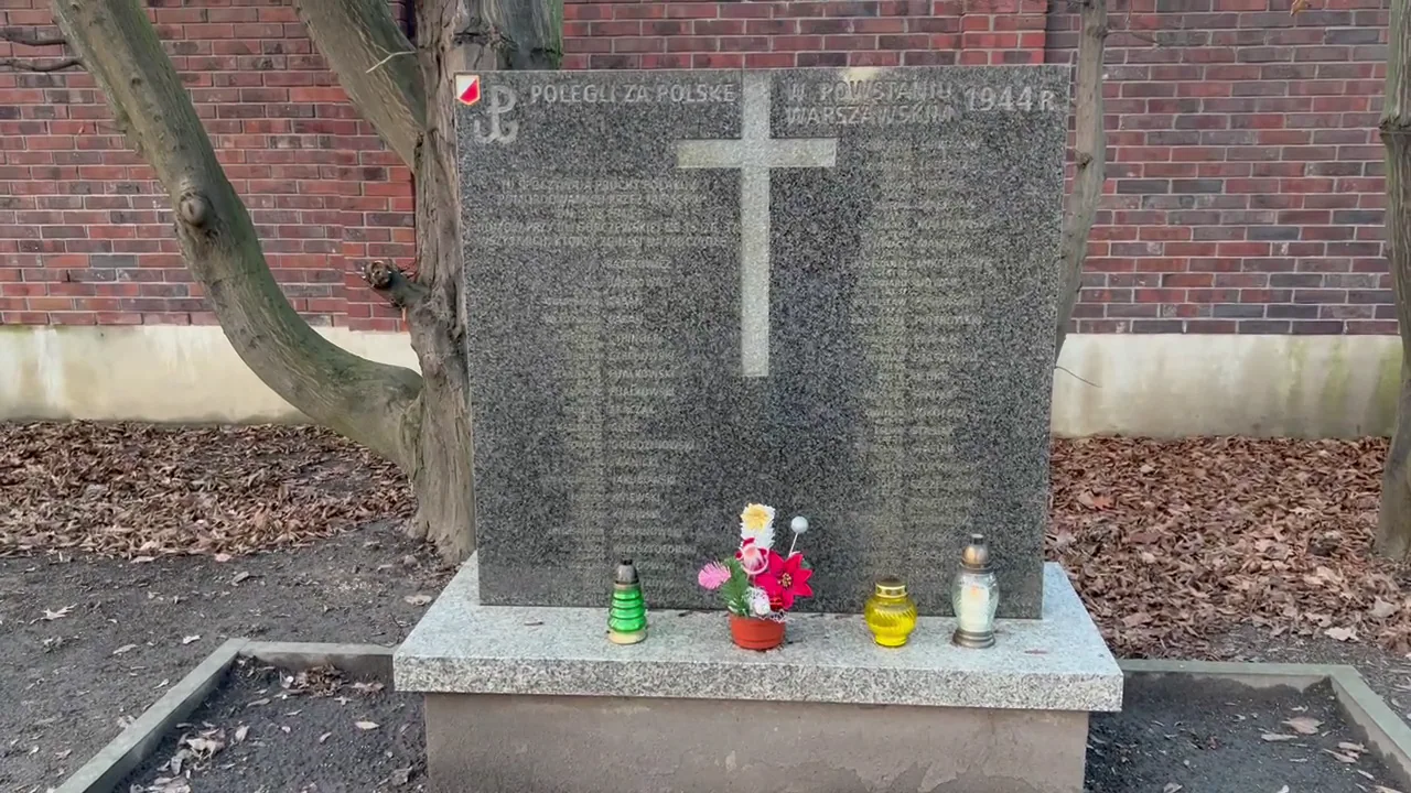 Original photograph of The monumental cross and memorial landscape are reminders that this remains a pl at Warsaw Insurgents Cemetery